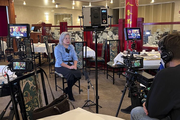 Jenny Chin being interviewed at Li Wah